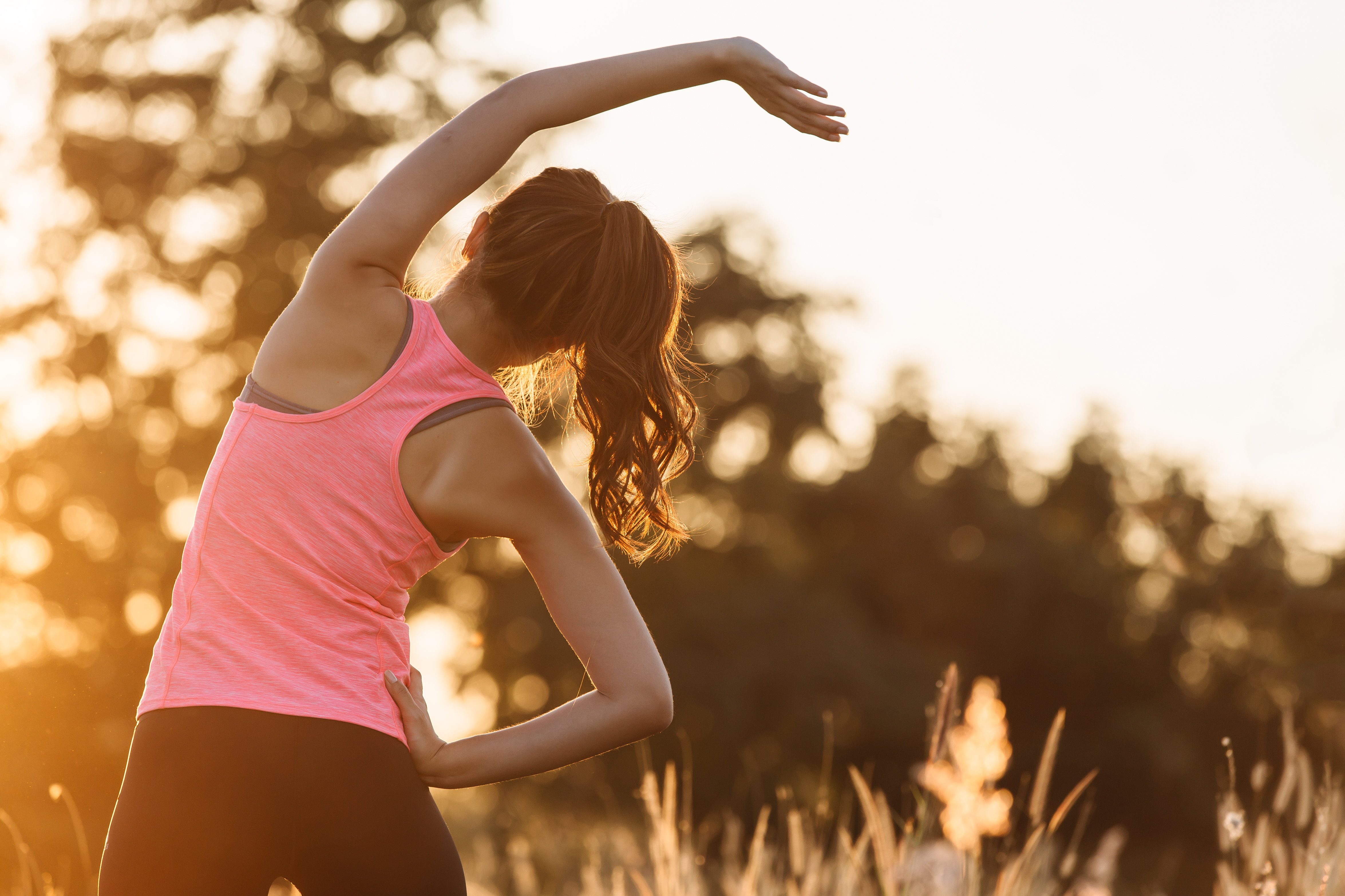 Woman exercising to maintain Bellevue plastic surgery results